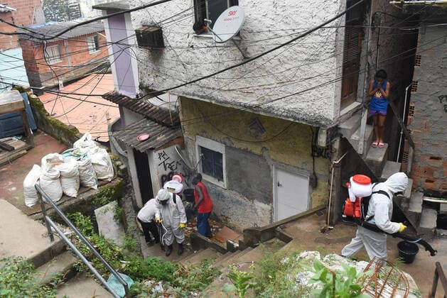 April 10, 2020: April 11.., 2020, Rio De Janeiro - ......Residents of the Santa Marta favela, in Botafogo, in the South Zone of Rio, start this Friday (10) to work on cleaning the areas of the community on their own. The objective is to prevent the lack of sanitary conditions from facilitating the expansion of the Covid-19 region. volunteers start the process with personal protective equipment (PPE). The Botafogo neighborhood, where the Santa Marta slum is located, had 36 confirmed cases of the new coronavirus as of this Sunday, according to the State Health Secretariat Panel. In the municipality of Rio alone, 1068 cases were recorded, according to the same panel. Cases across the state totaled 1394 cases..on April 10, 2020. - ZUMAt142 20200410_zap_t142_007 Copyright: xFabioxTeixeirax