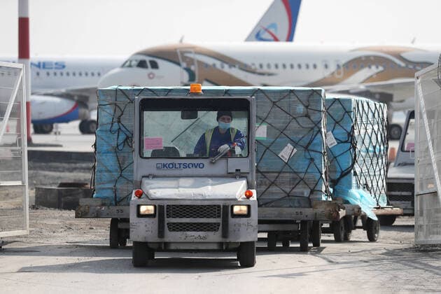 YEKATERINBURG, RUSSIA - APRIL 13, 2020: Transporting humanitarian aid delivered by a Sunday Airlines plane at Koltsovo International Airport. The first of the four humanitarian shipments to Russia s Ural Federal District, the charter flight from Shanghai has brought around $5m worth of medical supplies, such as non-reusable and high-level protection masks, face shields, protective goggles and suits, antiseptics and touch-free thermometers, totaling over 100t in weight. Equally divided between the Sverdlovsk and Chelyabinsk Regions, it will be sent to healthcare, budgetary, charitable institutions and volunteer organisations. Donat Sorokin TASS TS0D57F5