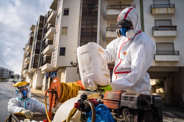 April 14, 2020, Ericeira, Portugal: An employee of the Ericeira parish council, equipped with the recommended protective materials, prepares the solution based on hypochlorite (bleach), for disinfecting the street..The municipality of Mafra had 70 cases of COVID-19 pandemic. In order to prevent the spread of the virus, the Ericeira Parish Council perform weekly street disinfection. Ericeira Portugal - ZUMAs197 20200414_zaa_s197_176 Copyright: xHenriquexCasinhasx