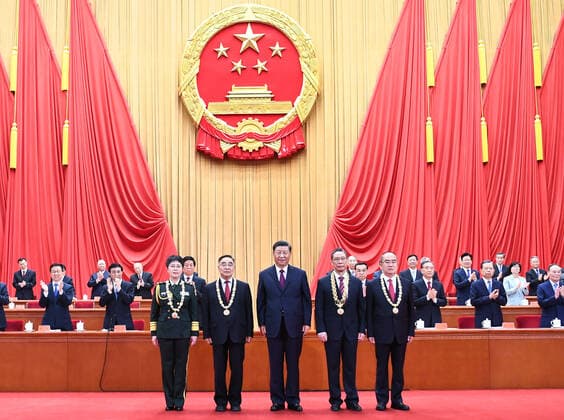 (200908) -- BEIJING, Sept. 8, 2020 -- Chinese President Xi Jinping, also general secretary of the Communist Party of China Central Committee and chairman of the Central Military Commission, presents medals to the recipient of the Medal of the Republic Zhong Nanshan (2nd R, front), and recipients of the national honorary title, the People s Hero, Zhang Boli (2nd L, front), Zhang Dingyu (1st R, front) and Chen Wei (1st L, front), at a meeting commending role models in the country s fight against the COVID-19 epidemic at the Great Hall of the People in Beijing, capital of China, Sept. 8, 2020. ) CHINA-BEIJING-COVID-19 FIGHT-ROLE MODELS-COMMENDATION MEETING (CN) XiexHuanchi