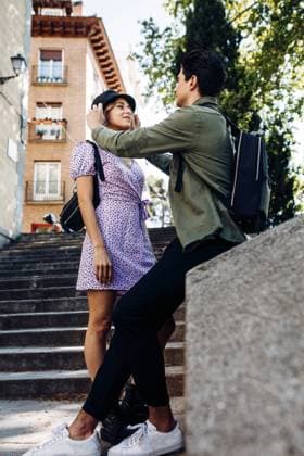 Young cheerful couple in casual clothes having fun during dating outdoors, Model released Copyright: xRamonxLopezx MR