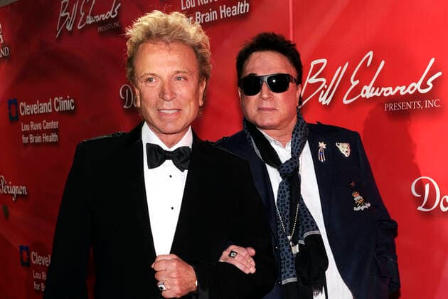 January 14, 2021: SIEGFRIED FISCHBACHER, an illusionist known for working with exotic cats as one half of Siegfried & Roy, has died from pancreatic cancer, according to his publicist Dave Kirvin. He was 81. FILE PICTURE SHOT ON: February 18, 2012, Las Vegas, Nevada, USA: SIEGFRIED FISCHBACHER (L) and ROY HORN arrive at the Keep Memory Alive foundation s Power of Love Gala celebrating Muhammad Ali s 70th birthday at the MGM Grand Garden Arena on Saturday. Las Vegas USA - ZUMAbk3_ 20120218_zaf_bk3_117 Copyright: xDavidxBeckerx