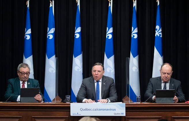 January 21, 2021, Quebec, PQ, Canada: Quebec Premier Francois Legault, flanked by Quebec Health Minister Christian Dube, right, and Horacio Arruda, Quebec director of National Public Health, speaks at a news conference on the COVID-19 pandemic, Thursday, January 21, 2021 at the legislature in Quebec City. Quebec Canada - ZUMAc35_ 20210121_zaf_c35_035 Copyright: xJacquesxBoissinotx