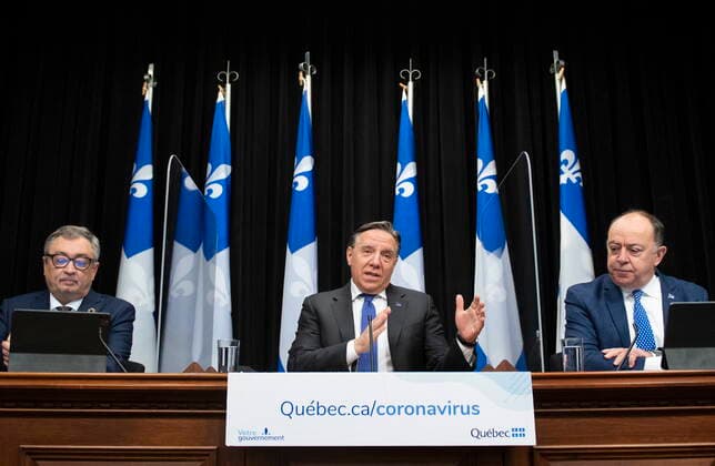 January 28, 2021, Quebec, PQ, Canada: Quebec Premier Francois Legault, centre, speaks during a news conference on the COVID-19 pandemic, Thursday, January 28, 2021 at the legislature in Quebec City. Legault is flanked by Horacio Arruda, Quebec director of National Public Health, left, and Quebec Health Minister Christian Dube. Quebec Canada - ZUMAc35_ 20210128_zaf_c35_032 Copyright: xJacquesxBoissinotx