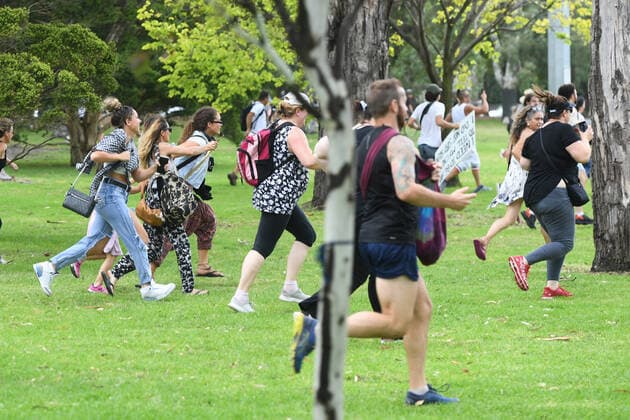 ANTI VACCINATION RALLY MELBOURNE, Protesters run through Fawkner Park during an anti-vaccination rally in Melbourne, Saturday, February 20, 2021. The national rollout of the Pfizer vaccine will begin on Monday in what will be the largest exercise of its kind in Australia s history. ( NO ARCHIVING, EDITORIAL USE ONLY, NO USE IN BOOKS WITHOUT CONSENT MELBOURNE VIC AUSTRALIA Copyright: xERIKxANDERSONx 20210220001521826841