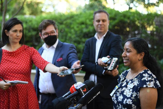 NSW COVID19 VACCINE ROLLOUT, Gayathry Vellangalloor, the first person to receive the Pfizer jab in NSW, speaks to media following the start of the COVID-19 vaccination program at Royal Prince Alfred Hospital in Sydney, Monday, February 22, 2021. ( NO ARCHIVING, EDITORIAL USE ONLY, NO USE IN BOOKS WITHOUT CONSENT SYDNEY NSW AUSTRALIA Copyright: xJOELxCARRETTx 20210222001522239578