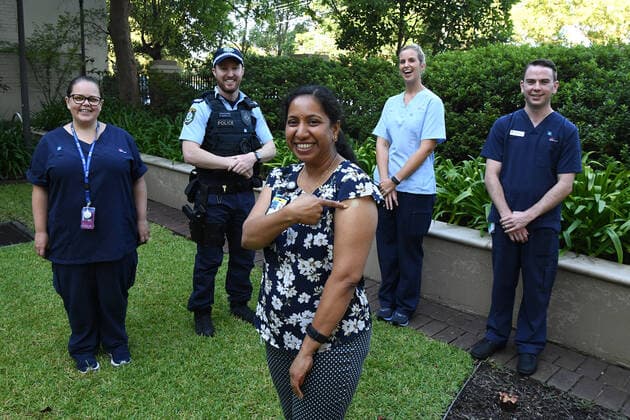 NSW COVID19 VACCINE ROLLOUT, Gayathry Vellangalloor, the first person to receive the Pfizer jab in NSW, poses for a photo following the start of the COVID-19 vaccination program at Royal Prince Alfred Hospital in Sydney, Monday, February 22, 2021. ( NO ARCHIVING, EDITORIAL USE ONLY, NO USE IN BOOKS WITHOUT CONSENT SYDNEY NSW AUSTRALIA Copyright: xJOELxCARRETTx 20210222001522240635