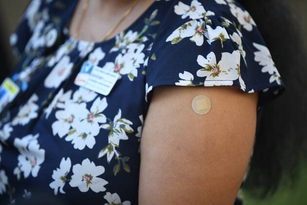 NSW COVID19 VACCINE ROLLOUT, Gayathry Vellangalloor, the first person to receive the Pfizer jab in NSW, speaks to media following the start of the COVID-19 vaccination program at Royal Prince Alfred Hospital in Sydney, Monday, February 22, 2021. ( NO ARCHIVING, EDITORIAL USE ONLY, NO USE IN BOOKS WITHOUT CONSENT SYDNEY NSW AUSTRALIA Copyright: xJOELxCARRETTx 20210222001522240668