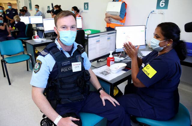 NSW COVID19 VACCINE ROLLOUT, Police officer Lachlan Pritchard was the second person in NSW to receive the Pfizer vaccination at the Royal Prince Alfred Hospital Vaccination Hub in Sydney, Monday, February 22, 2021. Australia will begin its roll out of the Pfizer coronavirus vaccine on Monday, the country s most complicated logistical exercise to date. ( NO ARCHIVING, EDITORIAL USE ONLY, NO USE IN BOOKS WITHOUT CONSENT SYDNEY NSW AUSTRALIA Copyright: xTobyxZernax 20210222001522255014