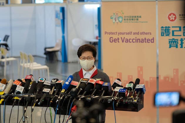 February 22, 2021, Hong Kong, China: Carrie Lam, Hong Kong Chief Executive speaks to the media at the Community Vaccination Centre at the Hong Kong Central Library after getting the COVID-19 vaccination..Hong Kong Chief Executive Carrie Lam and members of her cabinet receive their first dose of of the COVID-19 vaccine in a bid to boost public confidence to the vaccine as the vaccination program for the public will begin on 26th February. Hong Kong China - ZUMAs197 20210222_zaa_s197_003 Copyright: xGeovienxSox