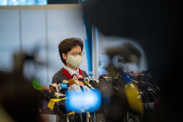 February 22, 2021, Hong Kong, China: Carrie Lam, Hong Kong Chief Executive speaks to the media at the Community Vaccination Centre at the Hong Kong Central Library after getting the COVID-19 vaccination..Hong Kong Chief Executive Carrie Lam and members of her cabinet receive their first dose of of the COVID-19 vaccine in a bid to boost public confidence to the vaccine as the vaccination program for the public will begin on 26th February. Hong Kong China - ZUMAs197 20210222_zaa_s197_013 Copyright: xGeovienxSox