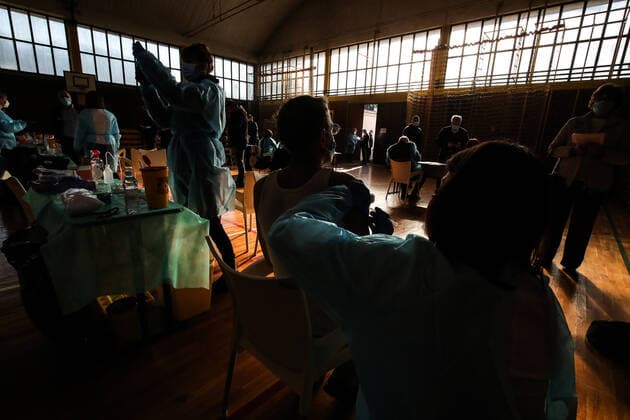 Vaccination in Zagreb, Croatia A woman receive coronavirus disease (COVID-19) vaccine during a mass vaccination in Zagreb, Croatia on February 23, 2021. SanjinxStrukic PIXSELL