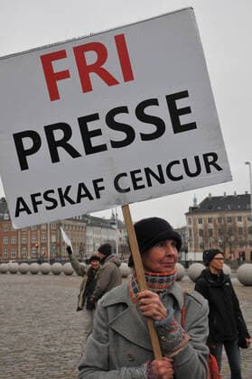 Copenhagen, Denmark. 23 February 2021, Danes proetesting againest coronavirus pandemic new debate in danish parliamenet about quick corona virus pandemic law in danish parliament with all political parties and stage anti pandemic law debates in front of danish parliament and danish police stand peaceful proteact danish parliament in front christiansborg danish parliament in Copenhagen. (Photo..Francis Dean Deanpictures)