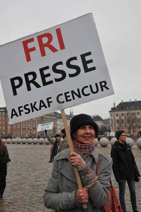 Copenhagen, Denmark. 23 February 2021, Danes proetesting againest coronavirus pandemic new debate in danish parliamenet about quick corona virus pandemic law in danish parliament with all political parties and stage anti pandemic law debates in front of danish parliament and danish police stand peaceful proteact danish parliament in front christiansborg danish parliament in Copenhagen. (Photo..Francis Dean Deanpictures)