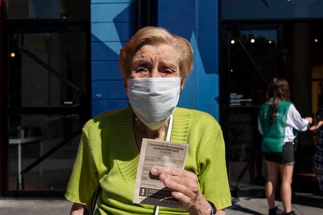 February 23, 2021, City of Buenos Aires, City of Buenos Aires, Argentina: INT. WorldNews. COVID-19. February 23, 2021. City of Buenos Aires, Argentina.- Martha Pairo, 94 years old, shows her vaccine certificate for SARS CoV2 (COVID-19) on Feb 23, 2021, outside a temporary Vaccination Center at Centro Cultural Recoleta, City of Buenos Aires, Argentina..Adults over 80 years old are being vaccinated for SARS CoV2 (COVID-19) since Feb 22, 2021 in City of Buenos Aires, Argentina. City of Buenos Aires Argentina - ZUMAf135 20210223_zap_f135_001 Copyright: xJulietaxFerrariox