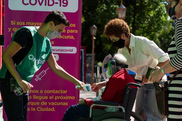 February 23, 2021, City of Buenos Aires, City of Buenos Aires, Argentina: INT. WorldNews. COVID-19. February 23, 2021. City of Buenos Aires, Argentina.- Adults older than 80 years old enter the temporary Vaccination Center at Centro Cultural Recoleta, City of Buenos Aires, Argentina, for being vaccinated for SARS CoV2 (COVID-19) on Feb 23, 2021. City of Buenos Aires Argentina - ZUMAf135 20210223_zap_f135_003 Copyright: xJulietaxFerrariox
