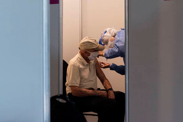 February 23, 2021, City of Buenos Aires, City of Buenos Aires, Argentina: INT. WorldNews. COVID-19. February 23, 2021. City of Buenos Aires, Argentina.- Adults over 80 years old are vaccinated for SARS CoV2 (COVID-19) on Feb 23, 2021, at a temporary Vaccination Center at Centro Cultural Recoleta, City of Buenos Aires, Argentina. City of Buenos Aires Argentina - ZUMAf135 20210223_zap_f135_005 Copyright: xJulietaxFerrariox