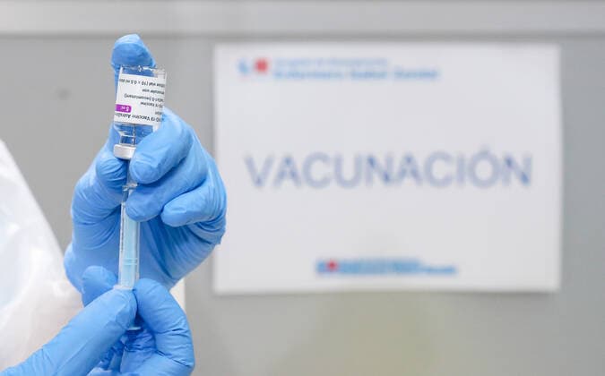 A health professional holds a vial with the vaccine against COVID-19 from AstraZeneca, in the Pavilion 3 of the Public Hospital Enfermera Isabel Zendal, in Madrid, (Spain), on February 23, 2021. This Tuesday begins the vaccination in the pavilion 3 of the hospital with the vaccine of AstraZeneca to 400 people of External Health, AENA, inspectors of Public Health, of Institute of Social Security, professionals of reformatories, Forensic Doctors, Students of CC Health and veterinarians. These new groups to be vaccinated will be joined by those over 80 years of age on Thursday 25 February in the Primary Care centres of each of the health areas of the community with 50,000 doses. 23 FEBRUARY 2021;ISABEL DÃAZ AYUSO;AYUSO;MADRID;COMMUNITY OF MAD Copyright: xLagenciaEPxPRESS M.FERNÃNDEZ.xPOOLx 3576563