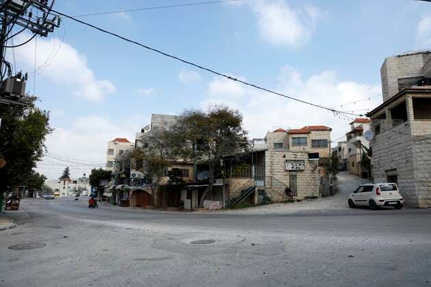 February 28, 2021, Jenin, West Bank, Palestinian Territory: A deserted street is pictured during a complete closure, amid the coronavirus lockdown in the town of Zababdeh, south of Jenin, in the West Bank on February 28, 2021. Prime Minister Mohammad Shtayyeh announced a new set of restrictions in response to a recent surge in coronavirus infections, including of British and South African mutants, in Palestine.A lockdown of all public and private schools for all classes, except for high school students for a period of 12 days, including kindergartens..A lockdown of all universities, educational and vocational institutes and shifting to distance e-learning programs. A maximum of 50 percent of administrative staff are allowed access to univer - ZUMAap3_ 20210228_zaf_ap3_041 Copyright: xOdayxDaibesx