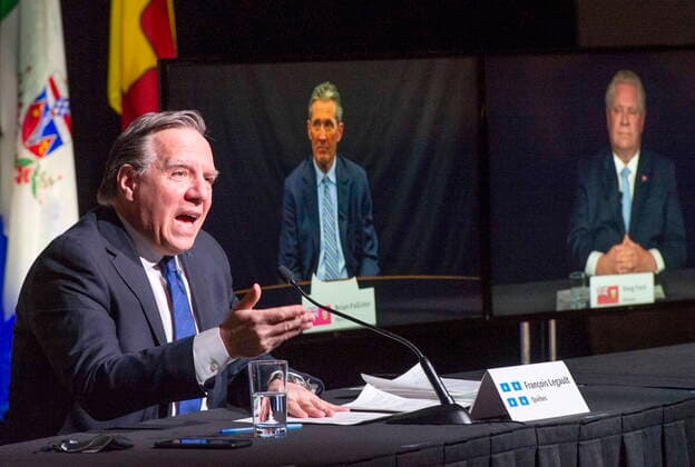 March 4, 2021, Montreal, PQ, Canada: Quebec Premier Francois Legault chairs a premiers virtual news conference as premiers Brian Pallister, Manitoba, and Doug Ford, Ontario, are seen on screen, Thursday, March 4, 2021 in Montreal. Montreal Canada - ZUMAc35_ 20210304_zaf_c35_034 Copyright: xRyanxRemiorzx