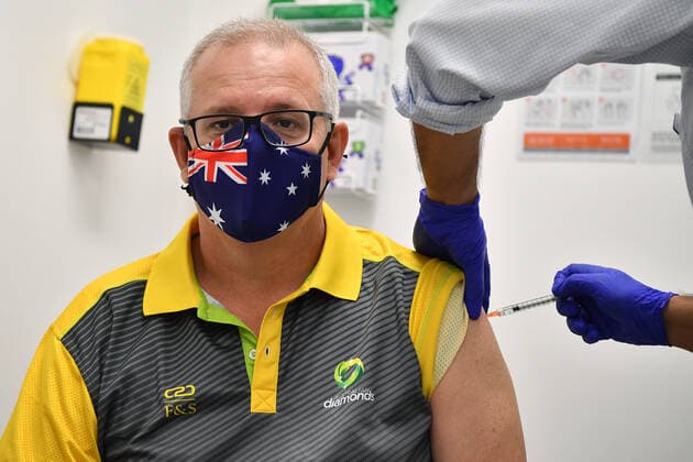 SCOTT MORRISON COVID19 VACCINATION, Australian Prime Minister Scott Morrison receives his second COVID-19 vaccination during a visit to Castle Hill Medical Centre in Sydney, Sunday, March 14, 2021. ( NO ARCHIVING, EDITORIAL USE ONLY, NO USE IN BOOKS WITHOUT CONSENT SYDNEY NSW AUSTRALIA Copyright: xJOELxCARRETTx 20210314001527235483