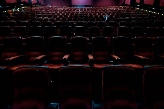 March 15, 2021, Los Angeles, California, USA: Moviegoers sitting in a socially distant seating arrangement at the AMC Theater on the first day of reopened theaters after being closed due to the COVID-19 pandemic in Burbank, California, on March 15, 2021. Los Angeles County restaurants can again welcome customers indoors, and movie theaters and fitness centers are able to reopen, all at limited capacity, with the county advancing today to the less-restrictive red tier of the state s Blueprint for a Safer Economy. Los Angeles USA - ZUMAc68_ 20210315_zaf_c68_018 Copyright: xRingoxChiux