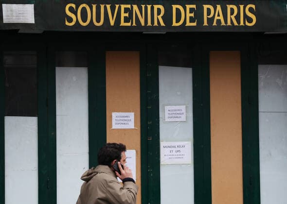 (210317) -- PARIS, March 17, 2021 -- A man wearing a mask passes by a closed souvenir store in Paris, France, March 17, 2021. France has entered a form of third wave (of the coronavirus pandemic) characterized by numerous virus variants, Prime Minister Jean Castex said on Tuesday, stressing that his government still considers vaccination a top priority of its strategy to stem the spread of the virus. On Tuesday, the health authorities reported 29,975 new infections across the country, bringing the cumulative total to 4,108,108. The number of single-day deaths jumped to 408, taking the total to 91,170. ) FRANCE-PARIS-COVID-19-THIRD WAVE GaoxJing