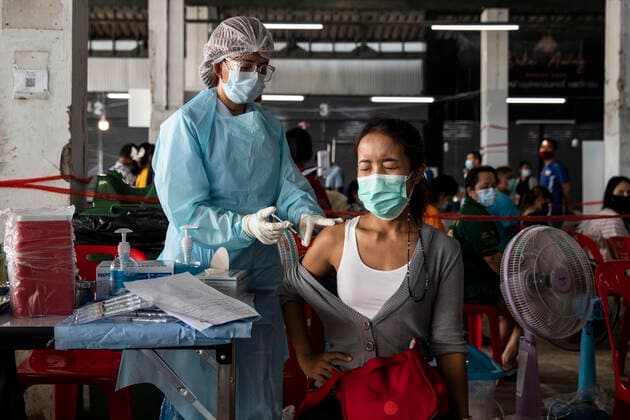 March 19, 2021, Thailand: A health worker administers a dose of CoronaVac, a Covid-19 coronavirus vaccine developed by Chinaâ€⠢s Sinovac Biotech ltd, in Bangkok, Thailand, on Friday March 19, 2021. Health workers have been vaccinating 600 residents per day, after a cluster of Covid-19 coronavirus cases were discovered at the Bang Khae market in Bangkok on Wednesday, March 17. Thailand - ZUMAm249 20210319_zip_m249_005 Copyright: xAndrexMalerbax