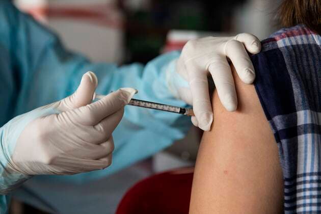 March 19, 2021, Thailand: A health worker administers a dose of CoronaVac, a Covid-19 coronavirus vaccine developed by Chinaâ€⠢s Sinovac Biotech ltd, in Bangkok, Thailand, on Friday March 19, 2021. Health workers have been vaccinating 600 residents per day, after a cluster of Covid-19 coronavirus cases were discovered at the Bang Khae market in Bangkok on Wednesday, March 17. Thailand - ZUMAm249 20210319_zip_m249_007 Copyright: xAndrexMalerbax