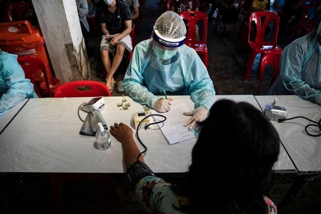 March 19, 2021, Thailand: A woman has her blood pressure checked, after receiving a dose of CoronaVac, a Covid-19 coronavirus vaccine developed by Chinas Sinovac Biotech ltd, in Bangkok, Thailand, on Friday March 19, 2021. Health workers have been vaccinating 600 residents per day, after a cluster of Covid-19 coronavirus cases were discovered at the Bang Khae market in Bangkok on Wednesday, March 17. Thailand - ZUMAm249 20210319_zip_m249_017 Copyright: xAndrexMalerbax