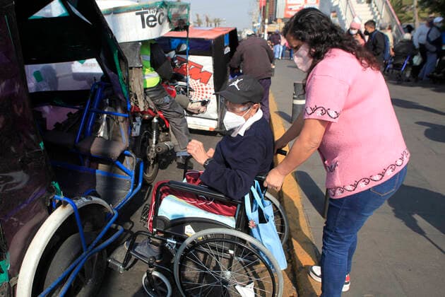 March 19, 2021, Nezahualcoyotl City, State Of Mexico, Mexico: A elderly arrives at vaccine center to receive a pass and be able to access the vaccination module, where health workers apply the Sputnik V vaccine, during the mass vaccination of the national vaccination program for adults over 60 years old against Covid-19 disease, at Nezahualcoyotl Sports Unit located in municipality of Nezahualcoyotl, State of Mexico. On March 19, 2021 in Nezahualcoyotl City, Mexico. Nezahualcoyotl City Mexico - ZUMAe321 20210319_zia_e321_007 Copyright: xAngelxMoralesxRizox