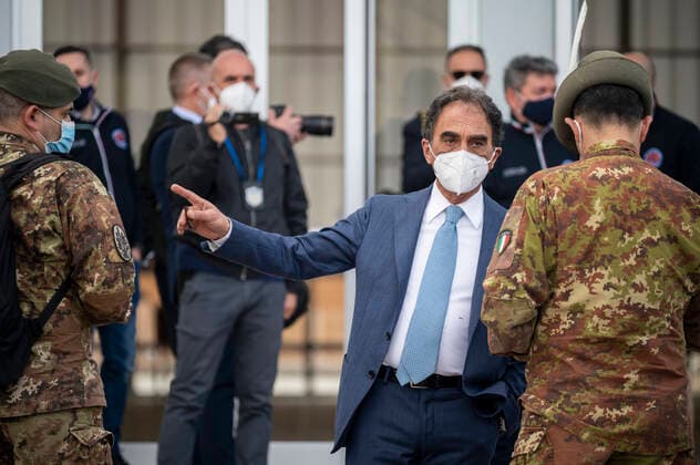 March 26, 2021, Catanzaro, Calabria, Italy: Mayor Sergio Abramo (c) seen talking with Army officers. Lieutenant general, Francesco Paolo Figliuolo, recently appointed as extraordinary commissioner for the COVID-19 emergency, and Fabrizio Curcio, Head of Department of Civil Protection, visited new vaccination hubs in Calabria. In Catanzaro, in the seacoast district â€oeLidoâ€Â, they visited the new Trade Fair Center selected as potential hub. Sergio Abramo, Mayor of Catanzaro, and Antonino Spirlo¬, and temporary Regional Governor, guided them during the visit. The increasing of vaccination hubs is considered a priority, specially considering the rising number of cases within the region. Catanzaro Italy - ZUMAs197 20210326_zaa_s197_136 Copyright: xValeriaxFerrarox