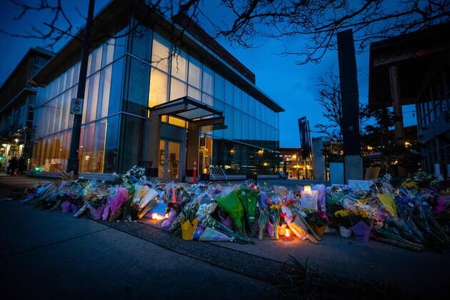 March 28, 2021, Vancouver, BC, Canada: Flowers, candles and written notes are seen at a memorial outside the Lynn Valley Library for the victims of a mass stabbing incident that happened Saturday inside and around the library, in North Vancouver, B.C., on Sunday, March 28, 2021. A 28-year-old man was charged Sunday with second-degree murder in a stabbing rampage that left a young woman dead and injured six others around a library in North Vancouver on Saturday. Vancouver Canada - ZUMAc35_ 20210328_zaf_c35_158 Copyright: xDarrylxDyckx