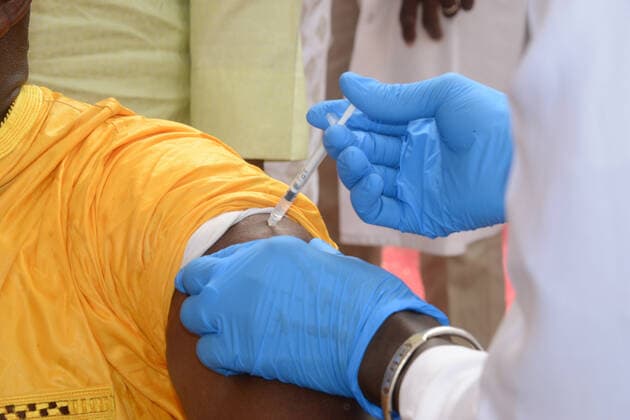 (210331) -- BAMAKO, March 31, 2021 -- A person receives the COVID-19 vaccine in Bamako, Mali, on March 31, 2021. Malian Minister of Health and Social Development Fanta Siby received Wednesday her first dose of COVID-19 vaccine, which symbolized the official kickoff of Mali s COVID-19 vaccination campaign. During this first phase of the vaccination campaign, according to the minister, a total of 21,406 health workers will be vaccinated in Bamako, epicenter of the pandemic in this West African country. (Photo by Xinhua) MALI-BAMAKO-COVID-19-VACCINATION HabibxKouyate