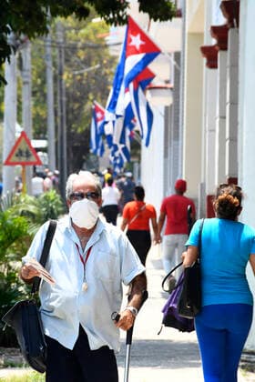 (210416) -- HAVANA, April 16, 2021 -- People walk on the street in Havana, Cuba, April 15, 2021. Cuba registered on Thursday 1,004 new COVID-19 infections in one day, reaching 90,408 cases in total, as well as four more deaths to total 491, the Ministry of Public Health said. (Photo by Xinhua) CUBA-HAVANA-COVID-19-CASES JoaquinxHernandez