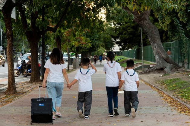 April 19, 2021, City of Buenos Aires, City of Buenos Aires, Argentina: INT. WorldNews. April 19, 2021. City of Buenos Aires, Argentina.- Parents take their kids to school on April 19, 2021, in the city of Buenos Aires despite Alberto Fernandez, president of Argentina, announced on Wednesday April 15, 2021, the suspension of presential education classes for 15 days, due to the increase in positive cases of Covid-19..The Governor of City of Buenos Aires, Horacio Rodriguez Larreta, filed a court case trying to continue education classrooms in person, and a judge allowed yesterday to continue in person. City of Buenos Aires Argentina - ZUMAf135 20210419_zap_f135_001 Copyright: xJulietaxFerrariox