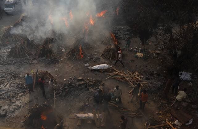 May 1, 2021, New Delhi, New Delhi, India: Covid 19 victims being cremated at Gazipur crematorium on May 1, 2021 in New Delhi, India..As many as 4,01,993 more people tested positive for Covid-19 in the last 24 hours, taking the cumulative caseload to 1,91,64,969, said the Union health ministry on Saturday. This is the highest number of new infections ever recorded in a day across the globe. New Delhi India - ZUMAp176 20210501_zip_p176_019 Copyright: xVijayxPandeyx