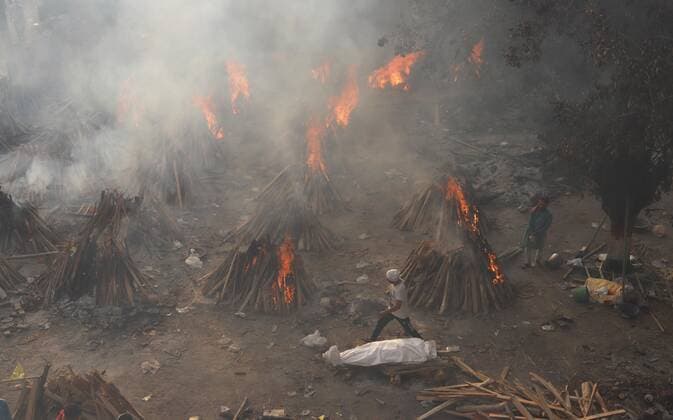 May 1, 2021, New Delhi, New Delhi, India: Covid 19 victims being cremated at Gazipur crematorium on May 1, 2021 in New Delhi, India..As many as 4,01,993 more people tested positive for Covid-19 in the last 24 hours, taking the cumulative caseload to 1,91,64,969, said the Union health ministry on Saturday. This is the highest number of new infections ever recorded in a day across the globe. New Delhi India - ZUMAp176 20210501_zip_p176_020 Copyright: xVijayxPandeyx