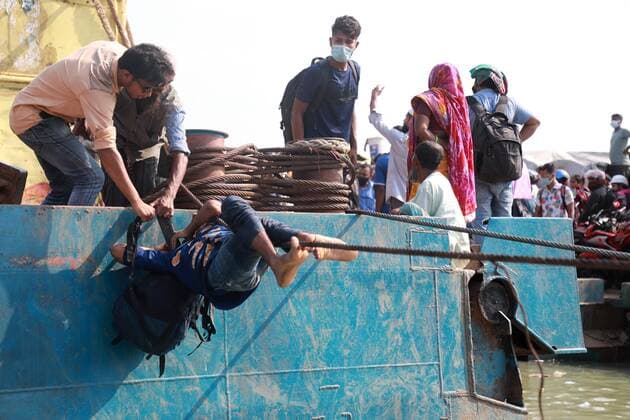 May 12, 2021, Dhaka, Dhaka, Bangladesh: May, 12, 2021 Bangladeshi people take place on an overcrowded ferry to go to their village homes for the Eid al-Fitr festival in Shimuliya, Munshiganj, on the outskirts of Dhaka, Bangladesh, May 12, 2021. Five people died after they fell sick due to the heat on two overcrowded ferries in Madaripur s Banglabazar today. Eight others fell ill at the same time this noon. Dhaka Bangladesh - ZUMAr338 20210512_zip_r338_049 Copyright: xHarun-Or-Rashidx