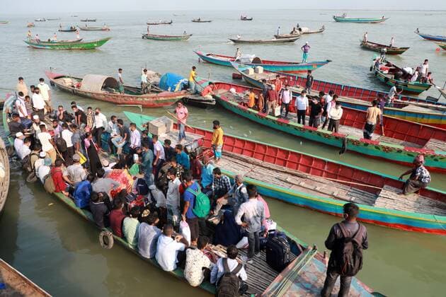May 12, 2021, Dhaka, Dhaka, Bangladesh: May, 12, 2021 Bangladeshi people take place on an overcrowded ferry to go to their village homes for the Eid al-Fitr festival in Shimuliya, Munshiganj, on the outskirts of Dhaka, Bangladesh, May 12, 2021. Five people died after they fell sick due to the heat on two overcrowded ferries in Madaripur s Banglabazar today. Eight others fell ill at the same time this noon. Dhaka Bangladesh - ZUMAr338 20210512_zip_r338_070 Copyright: xHarun-Or-Rashidx