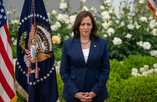 May 13, 2021, Washington, District of Columbia, USA: United States Vice President Kamala Harris listens to President Joe Biden gives remarks on the new Covid-19 Centers for Disease Control mask guidelines in the Rose Garden, at the White House in Washington, DC on Thursday, May 13, 2021. Fully vaccinated people no longer need to wear a face mask or stay six feet away from others in most settings, whether outdoors or indoors, the Centers for Disease Control and Prevention said in updated public health guidance released Thursday Washington USA - ZUMAs152 20210513_zaa_s152_214 Copyright: xTasosxKatopodisx-xPoolxViaxCnpx