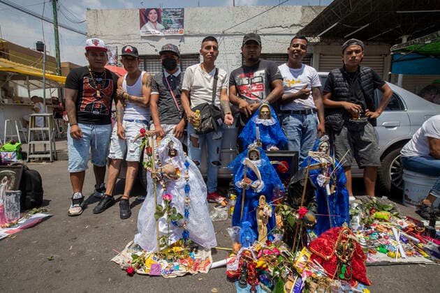 June 1, 2021, Mexico City, Mexico City, Mexico: A faithful holds a statue of Santa Muerte, while arriving at the Altar of Santa Muerte in the town of Tepito, as part of the celebrations that held on the first day of each month, hundreds of devotees attend to venerate it, give thanks for the favors and the fulfilled promises that this deity has granted them. La Santa Muerte or Santisima Muerte is a popular Mexican figure who personifies death and is an object of worship, the devotees of her are usually perceived as people associated with crime, gang activity, prostitution, drug trafficking. On June 1, 2021 in Mexico City, Mexico. Mexico City Mexico - ZUMAe321 20210601_zia_e321_019 Copyright: xRicardoxFloresx