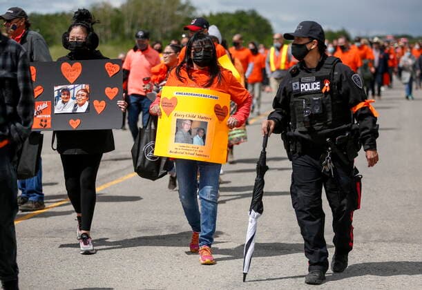 June 7, 2021, Calgary, ab, Canada: Members of the Tsuut ina Nation take part in a silent march in memory of the 215 unmarked graves found at Kamloops, B.C., in Calgary, Alta., Monday, June 7, 2021. Calgary Canada - ZUMAc35_ 20210607_zaf_c35_038 Copyright: xJeffxMcintoshx