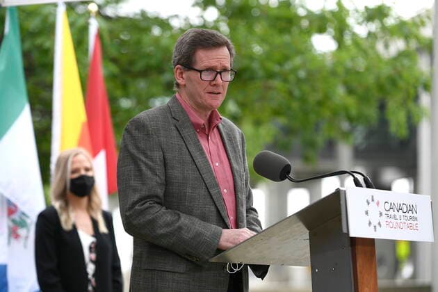June 14, 2021, Ottawa, on, Canada: Mike McNaney, President and CEO of the National Airlines Council of Canada which represents Air Canada, Air Transat, Jazz Aviation and Westjet, speaks during a news conference held by the Canadian Travel and Tourism Roundtable, a coalition of airports, airlines, hotels, boards of trade and chambers of commerce, to urge the federal government to implement a re-opening plan for travel and tourism, at the Ottawa Airport in Ottawa, on Monday, June 14, 2021. Ottawa Canada - ZUMAc35_ 20210614_zaf_c35_070 Copyright: xJustinxTangx