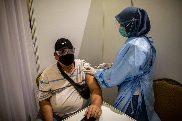 June 30, 2021, Tangerang Selatan, Banten, Indonesia: South Tangerang, Banten, Indonesia, June 30, 2021 : The South Tangerang Health Office administers vaccinations for the elderly, teachers, and people with disabilities. Indonesia continues to pursue the COVID-19 vaccination coverage target of up to 181 million coverage by the end of 2021 in the midst of the second wave of deadly new Covid-19 variants Tangerang Selatan Indonesia - ZUMAh128 20210630_zap_h128_020 Copyright: xDonalxHusnix