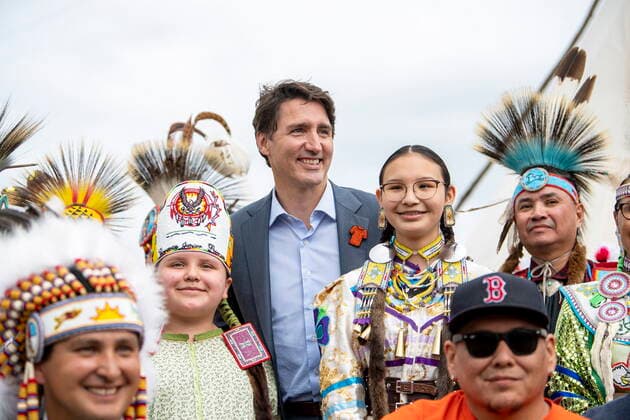 July 6, 2021, Cowessess First Nation, SK, Canada: Prime Minister Justin Trudeau stands for a group photograph following a signing ceremony as part of a transfer of control over children in care to the community, in Cowessess First Nation, Sask., Tuesday, July 6, 2021. Cowessess is also the site of a former residential school where, last month, ground-penetrating radar detected a potential 751 unmarked graves. Cowessess First Nation Canada - ZUMAc35_ 20210706_zaf_c35_065 Copyright: xLiamxRichardsx