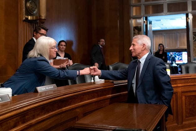 July 20, 2021, Washington, District of Columbia, USA: Anthony Fauci, director of the National Institute of Allergy and Infectious Diseases, fist bumps United States Senator Patty Murray (Democrat of Washington), Chairman, US Senate Health, Education, Labor and Pensions Committee following a Senate Health, Education, Labor, and Pensions Committee hearing at the Dirksen Senate Office Building in Washington on Tuesday, July 20, 2021 Washington USA - ZUMAs152 20210720_zaa_s152_082 Copyright: xStefanixReynoldsx-xPoolxViaxCnpx