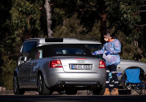 (210804) -- SYDNEY, Aug. 4, 2021 -- A staff member works at a nucleic acid testing site in Sydney, Australia, Aug. 4, 2021. As of Tuesday afternoon, there had been 34,833 confirmed cases of COVID-19 in Australia, and the number of locally acquired cases in the previous 24 hours was 219, according to the latest figures from the Department of Health. Recently, the country s most populous city of Sydney in the state of New South Wales (NSW), continued to battle the outbreak of COVID-19 triggered by the Delta variant. ) AUSTRALIA-SYDNEY-COVID-19-CASES BaixXuefei