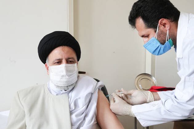 August 8, 2021, Tehran, Tehran, Iran: In this photo released by the official website of the office of the , President EBRAHIM RAISI receives his first shot of the Covid-19 COVIran Barekat vaccine, in Tehran, Iran, Sunday, Aug. 8, 2021. On Sunday, Iran reported more new infections and deaths across the country than on any other single day since the pandemic began. In the face of U.S. sanctions that complicate banking transactions and deep-rooted suspicion of the West, Iran has vigorously promoted the local production of coronavirus vaccines, doling out the experimental COVIran Barekat vaccine to most healthcare workers. Tehran Iran - ZUMAi98_ 20210808_zih_i98_002 Copyright: xIranianxPresidencyx