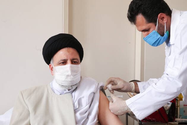 August 8, 2021, Tehran, Tehran, Iran: In this photo released by the official website of the office of the , President EBRAHIM RAISI receives his first shot of the Covid-19 COVIran Barekat vaccine, in Tehran, Iran, Sunday, Aug. 8, 2021. On Sunday, Iran reported more new infections and deaths across the country than on any other single day since the pandemic began. In the face of U.S. sanctions that complicate banking transactions and deep-rooted suspicion of the West, Iran has vigorously promoted the local production of coronavirus vaccines, doling out the experimental COVIran Barekat vaccine to most healthcare workers. Tehran Iran - ZUMAi98_ 20210808_zih_i98_003 Copyright: xIranianxPresidencyx